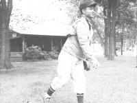August 23, 1942 White Hall, Wisconsin. Cold day 58 degrees. Warm up before game. [Courtesy of Leslie Taniyama]