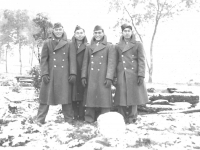 Camp McCoy Sept. 26, 1942 Just before leaving for Madison. A. Sahara, Me,  T. Ibaraki, T. Okumura. Notice snowball in front. [Courtesy of Leslie Taniyama]