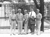 Tom Matsumura and friends go with a guide around the Chicago zoo. [Courtesy of Florence Matsumura]