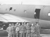 The MIS company poses next to a transport plane. [Courtesy of Florence Matsumura]