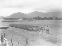 B Company marches in formation. [Courtesy of Velma Nakahara]