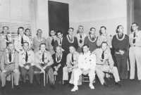 Post war dinner honoring Hawaii doctors who served in the armed forces.  Front row (l-r): Comdr. Stanley J.G. Nowak, (MC) USDR., Captain Dick M. Groen (MC) USN, Lt. Comdr. Clayton B. Ethridge (MC) USN, Drs. Clarence Frank, C.W. Trexler, Joseph Palma, Robert Milliard.; Standing: Lt. Comdr. Charles W. Peabody (MC) USNR, Lt. Comdr. Samuel H. Gray (MC) USNR, Drs. William M. Walek, R.B. Taus, John Helix, Richard Kainuma, E.K. Ching Hoon, Rodney Weet, Leslie Vasconcelles, T.L. Giles, Philip M. Corboy, Paul Withington  [Courtesy of Bob Kainuma]
